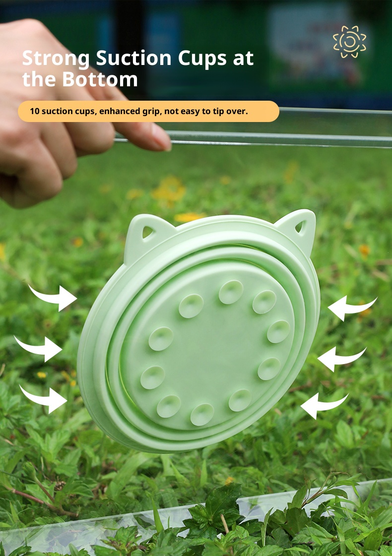 Collapsible travel dog bowl made of durable silicone with suction cups and hook for easy carrying