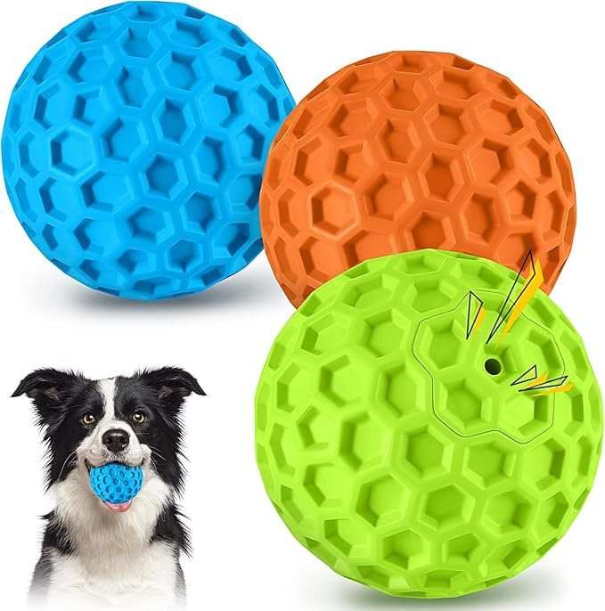 Three colorful indestructible squeaky dog chew toys made of durable rubber for aggressive chewers