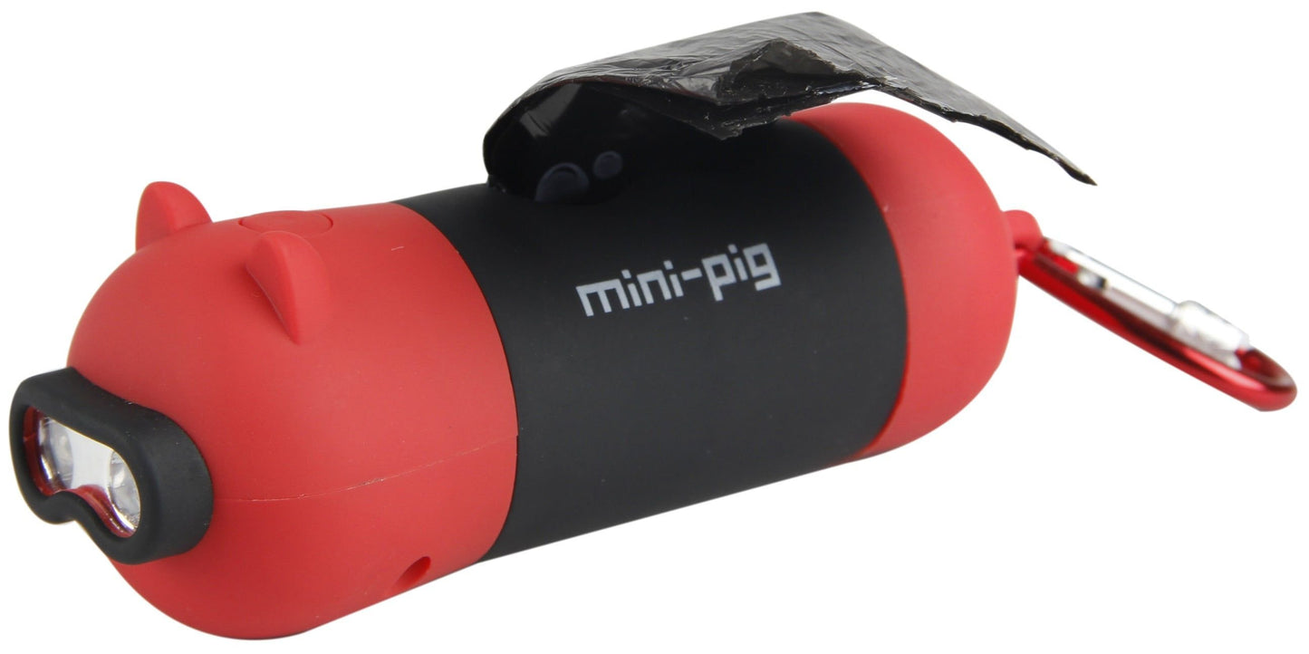 Oink dog poop bag holder with built-in LED flashlight and pig-shaped design for night walks