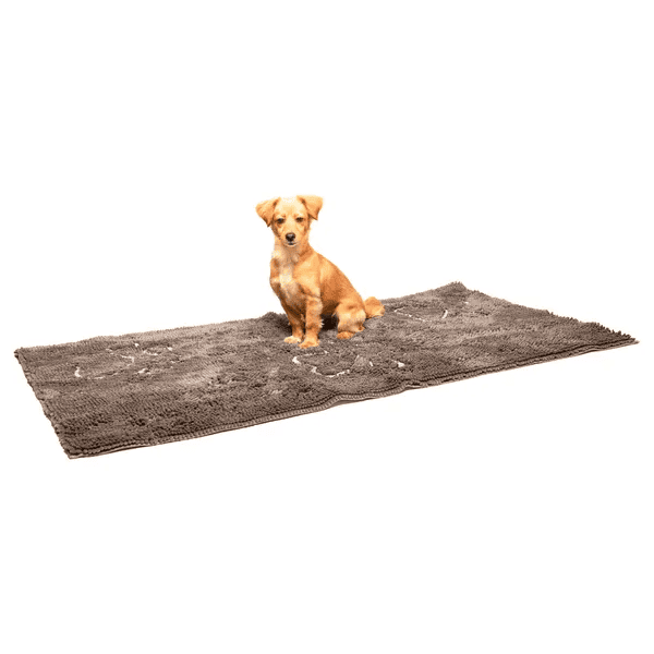 Small brown dog sitting on a large gray Dog Decor Runner mat with microfiber technology for water and mud absorption